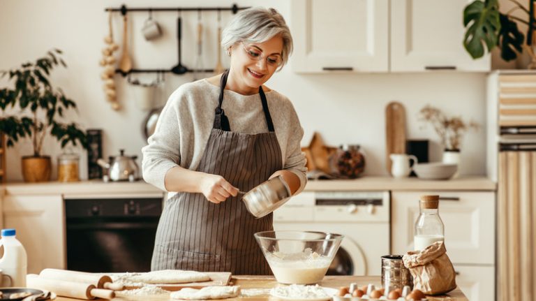 Happy,Old,Woman,Granny,Cooks,In,Kitchen,Kneads,Dough,And